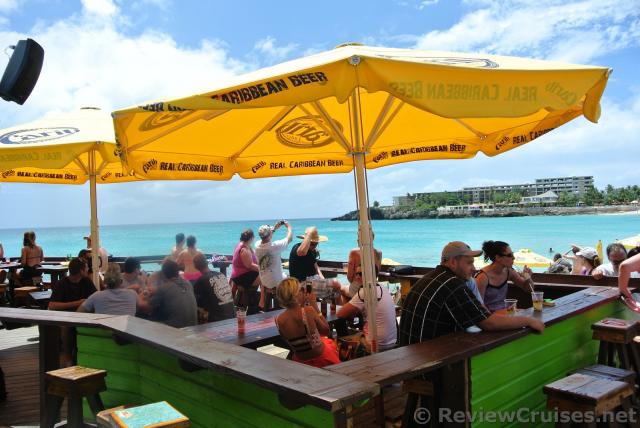 People relaxing at Sunset Grill adjacent to Maho Beach.jpg
