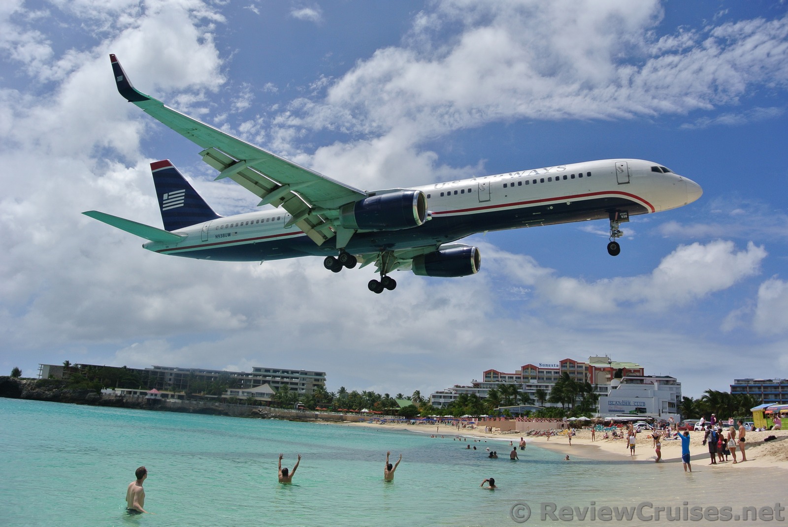 US Airways Boeing 737 N938UW Airplane flying over Maho Beach.jpg
