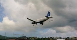 Jet Blue plane landing at Princess Juliana International Airport.jpg