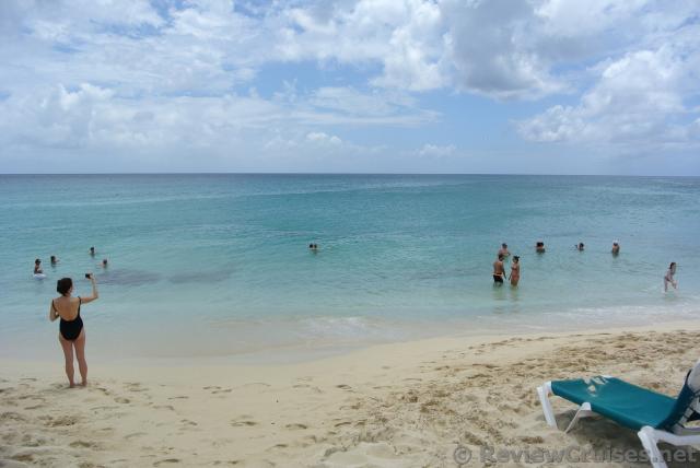 Visitors enjoy sand and waters of Maho Beach.jpg