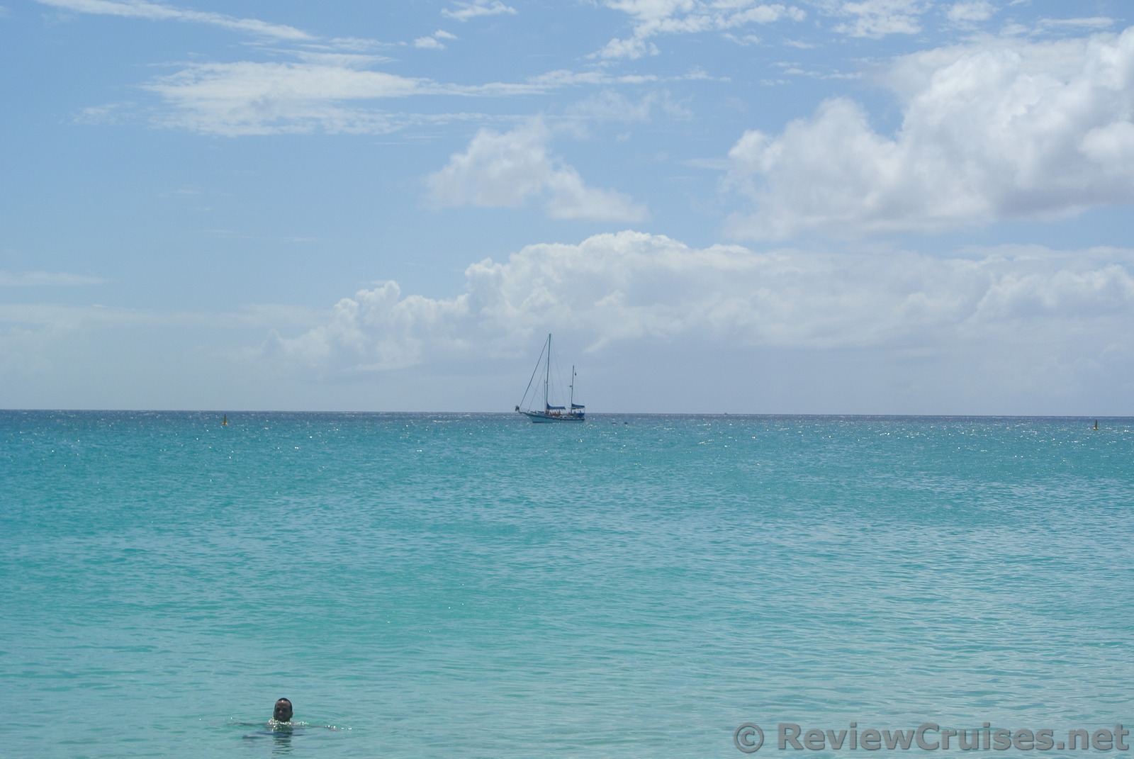 2 Mast Sailboat in the distance off of Maho Beach.jpg
