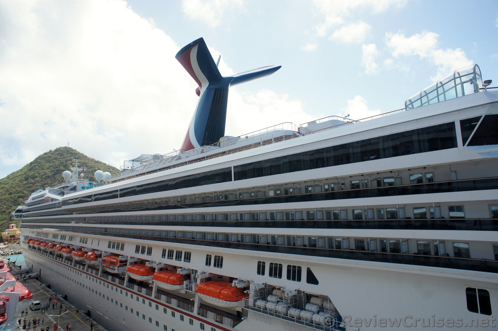 Port side of Carnival Freedom docked in St Martin.jpg
