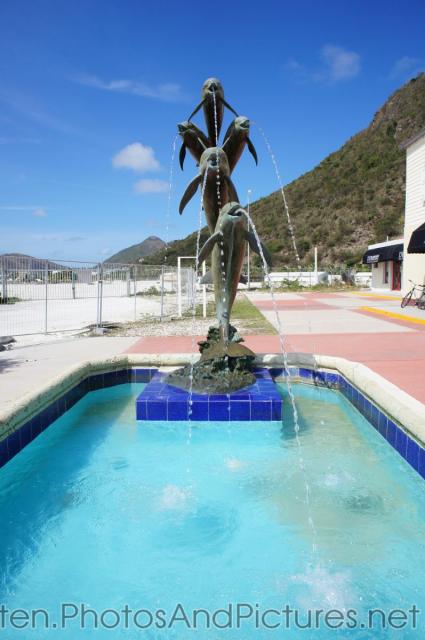 Dolphin fountain statue in St Maarten cruise terminal area.jpg
