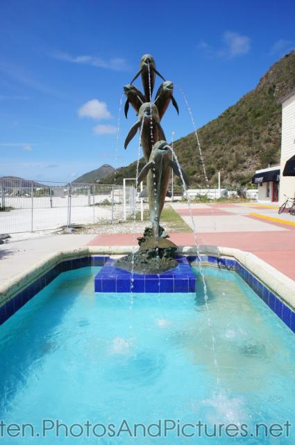 Dolphin fountain statue in St Maarten cruise terminal area.jpg