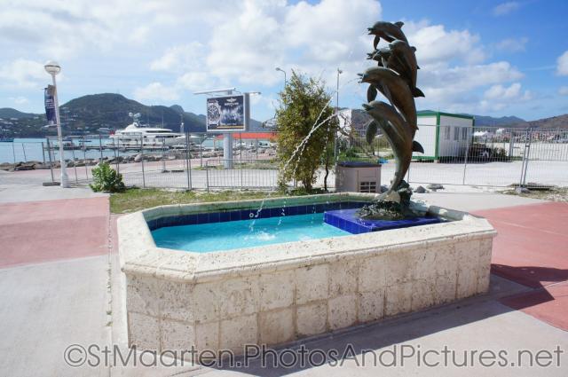Dolphins statue fountain at St Maarten cruise terminal.jpg
