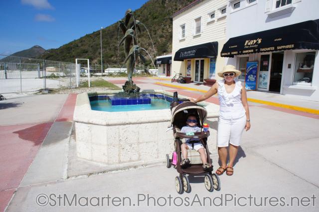 Darwin and Mommy next to dolphin fountain in St Maarten.jpg
