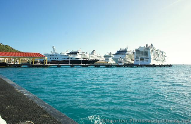 Several cruise ships docked at Philipsburg St Maarten as viewed from water taxi ramp.jpg
