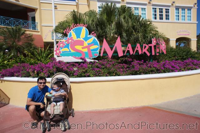 Darwin and daddy next to Welcome to St Maarten sign.jpg