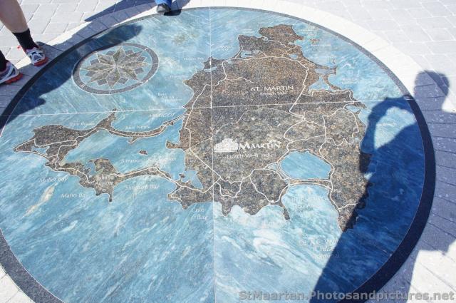 Circular map of St Maartin imprinted on the ground near pier of Philipsburg beach St Maarten.jpg
