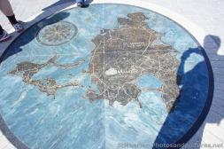 Circular map of St Maartin imprinted on the ground near pier of Philipsburg beach St Maarten.jpg