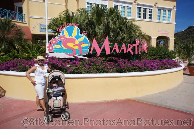 Darwin and Mommy next to Welcome to St Maarten sign.jpg
