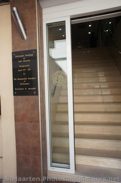 Entrance to the St Maarten Parliament Building and plaque that says it was inaugurated apr 28 2011 by Honourable President of Pa
